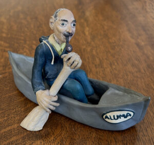 Dad in Canoe facing forward from the right, Fimo